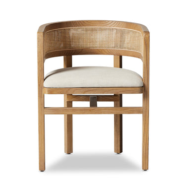 A wooden dining chair with a barrel-back design and a crosshatch cane panel on the seat and back.